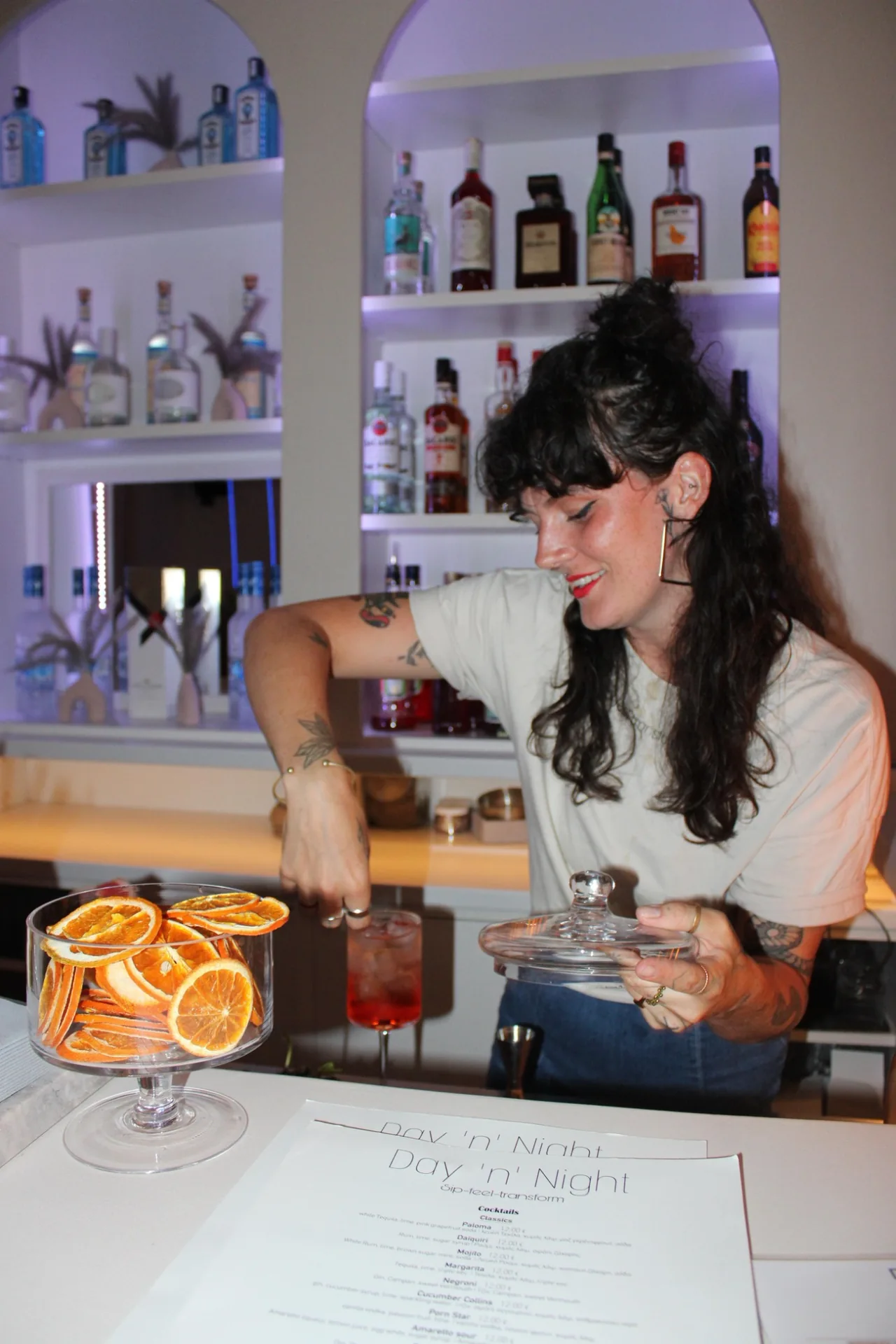 Bartender preparing a signature cocktail at Day ’n’ Night in Poros