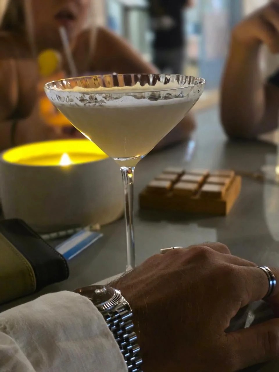 Signature cocktail served by candlelight at Day ’n’ Night