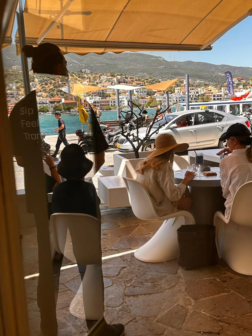 Guests enjoying the Day N Night waterfront terrace by day